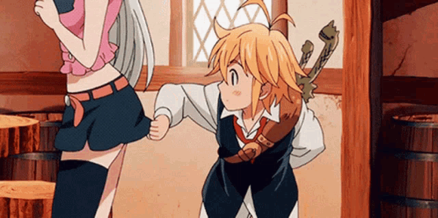 a boy and a girl are standing next to each other in a room with barrels