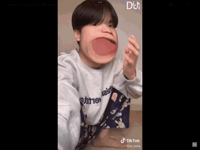 a screenshot of a tiktok video of a person making a funny face