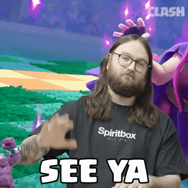 a man wearing glasses and a black shirt that says spiritbox