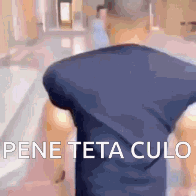 a blurred image of a person with the words pene teta culo written on it