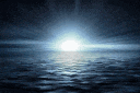 the sun is shining over the ocean at night