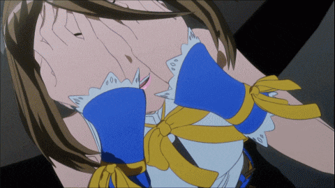 a girl in a blue and yellow outfit covering her face with her hands