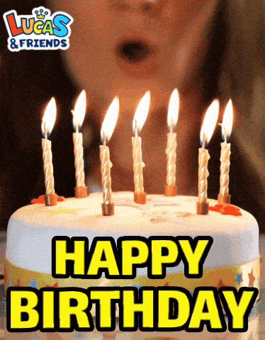 a birthday cake with candles and the words happy birthday