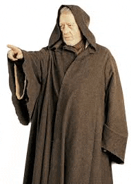 a man wearing a brown robe with a hood is pointing at something .