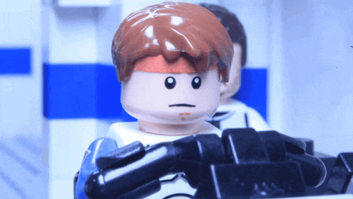 a lego figure with a bandana around his head