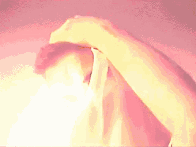 a close up of a person 's face with a white cloth on it