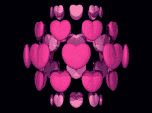 a bunch of pink hearts are stacked on top of each other on a black background