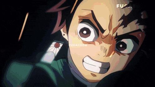 a close up of a person 's face with a fucatoon logo in the corner
