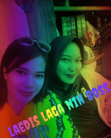 two girls are posing for a picture with the words laedis laga nih boss on the bottom