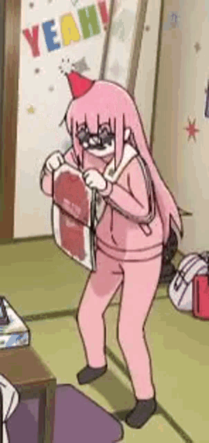 a pink anime girl is wearing a party hat and holding a bag in a room .