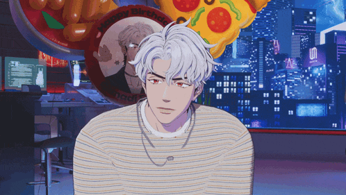 a man in a striped shirt stands in front of a pizza and a sign that says happy birthday