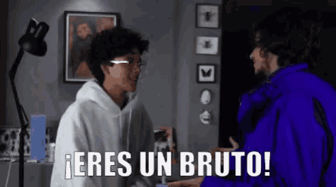 a man in a blue jacket says " eres un bruto " while talking to another man