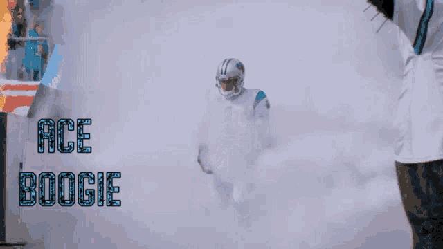 a man in a carolina panthers uniform is surrounded by smoke and the name ace boogie
