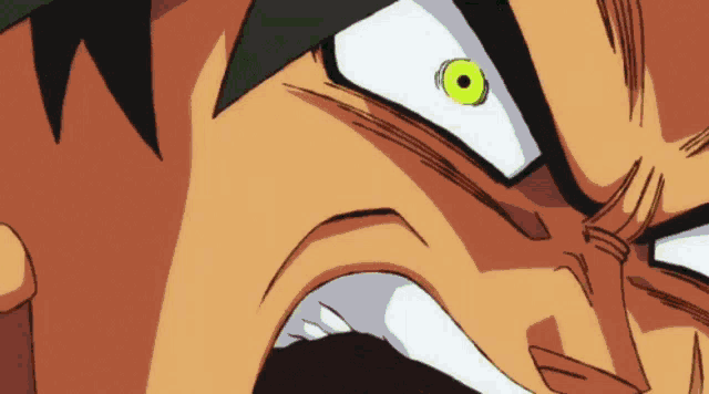 a close up of a man 's face with a yellow eye