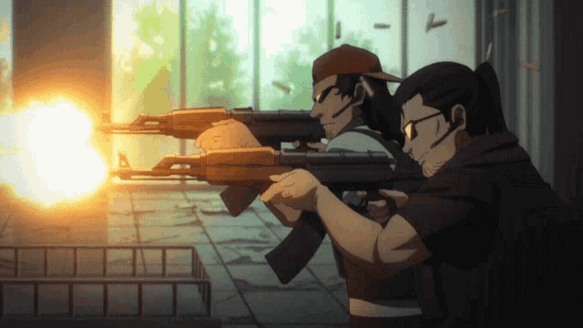 a man in a red hat is holding a gun