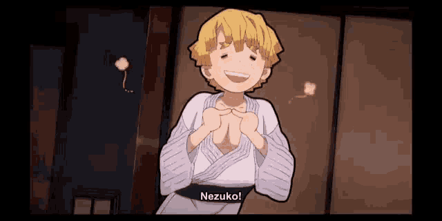 a cartoon character is smiling and making a heart with his hands while wearing a kimono .