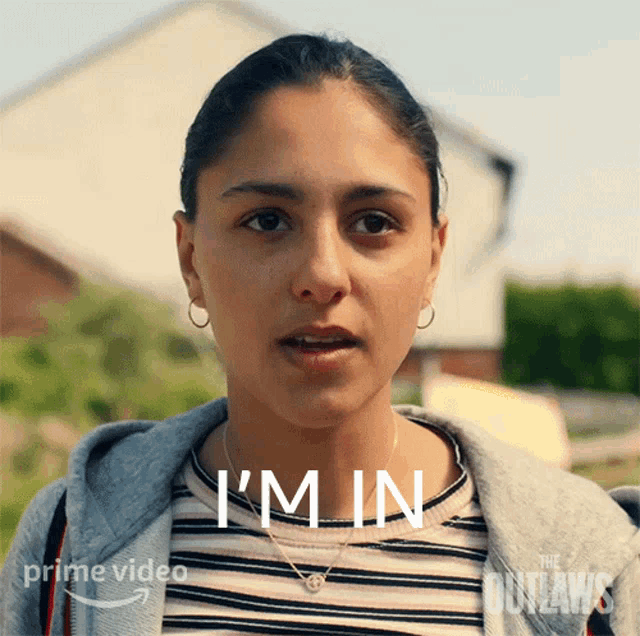 a woman says i 'm in in front of a prime video logo