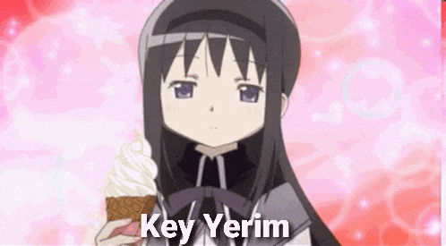 a girl is holding an ice cream cone with the words key yerim written on it