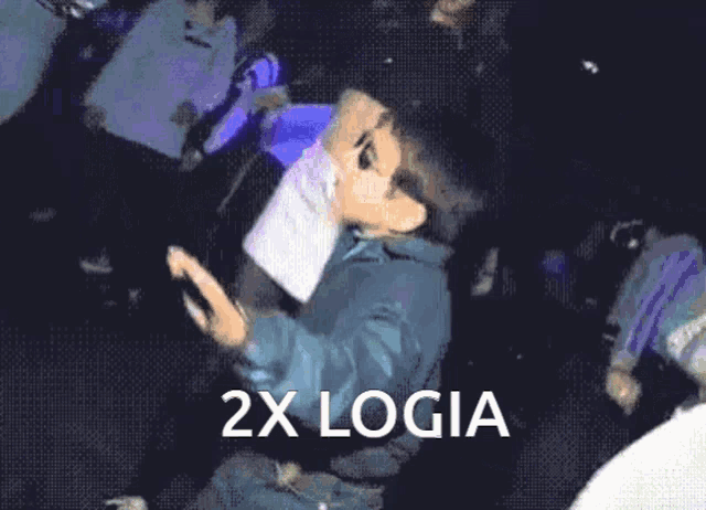 a pixelated image of a boy with the words " 2x logia " written below him