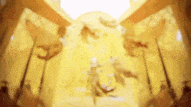 a blurry picture of a statue of a lion in a room with a white background .