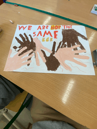 a drawing of hands with the words we are not the same on it