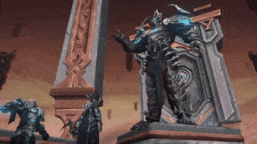 a statue of a man with a sword and shield stands in front of two other statues