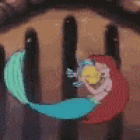 a close up of a cartoon character holding a yellow object in a circle .