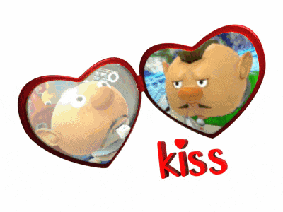 two heart shaped mirrors with cartoon characters and the word kiss