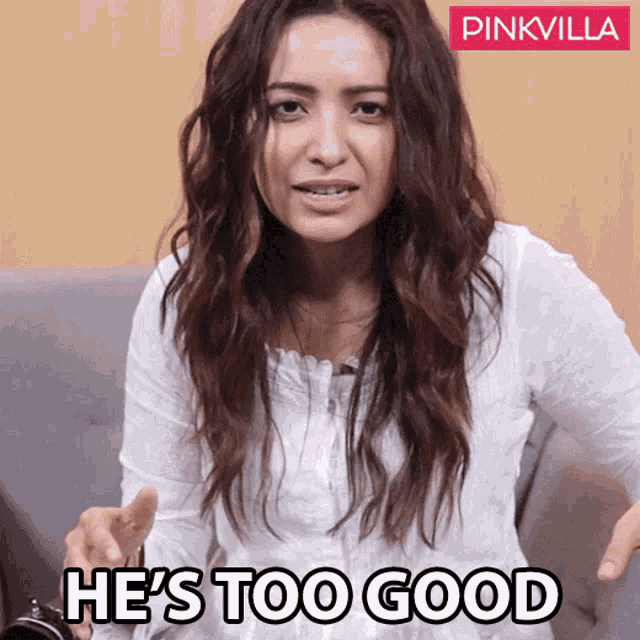 a woman sitting on a couch with the words he 's too good above her
