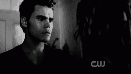 a black and white photo of a man and a woman with the cw logo visible