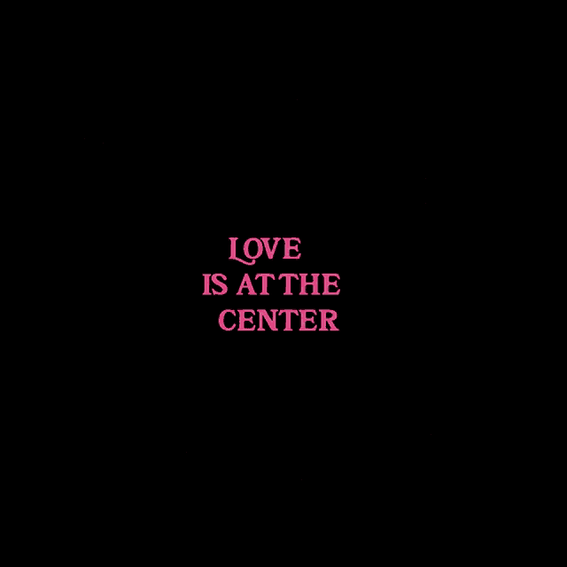 a pink circle with the words love is at the center