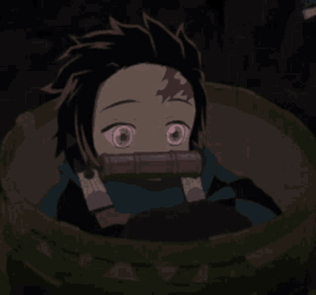 a cartoon character is laying in a basket with his eyes closed and his mouth open