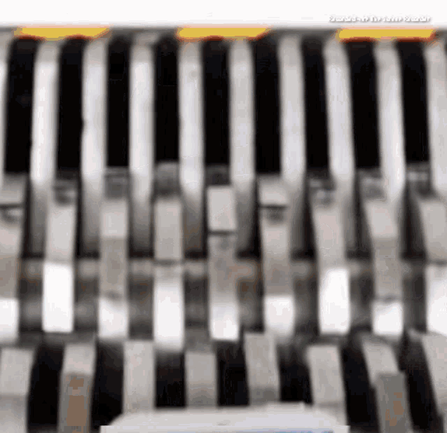 a close up of a metal machine with the words " stainless steel " on the bottom right