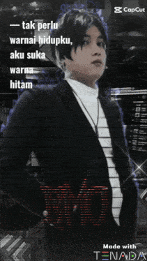 a man in a suit and white turtleneck stands in front of a sign that says " made with tenada "