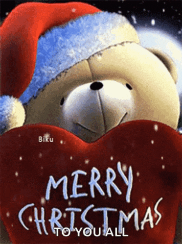a teddy bear wearing a santa hat is holding a red heart with the words merry christmas to you all written on it