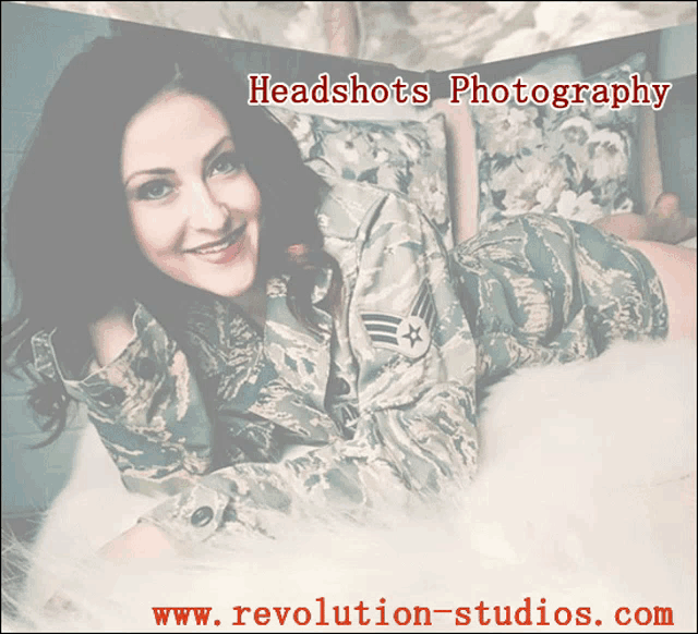 a woman in a military uniform is laying on a bed with the website revolution-studios.com at the bottom