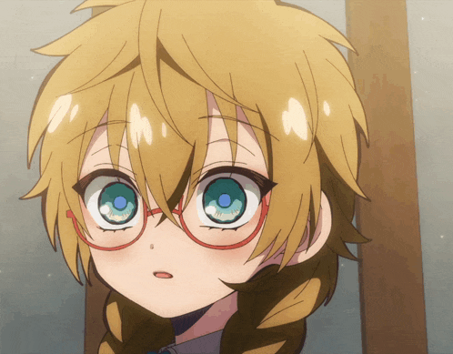 a close up of a person 's face with glasses