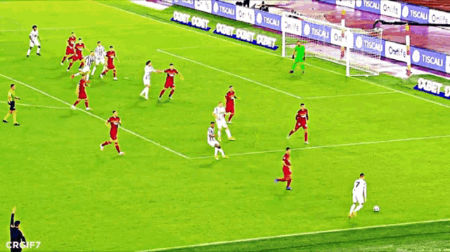a group of soccer players are playing on a field with a banner that says onlife on it