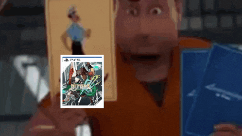 a man is holding a ps5 game called guilty gear r2