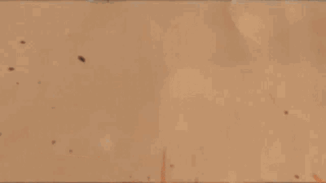 a group of rocks are flying through the air in a video game .