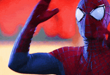 a close up of a person in a spider-man costume