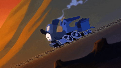 a blue train is going up a hill with smoke coming out of the chimney