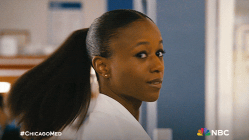 a woman with her hair in a ponytail is featured on a nbc ad