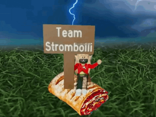 a person is holding a sign that says team stromboli on top of a pastry .
