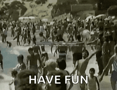 a large group of people are holding hands and walking on a beach with the words `` have fun '' .