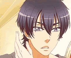 a close up of a man with purple eyes