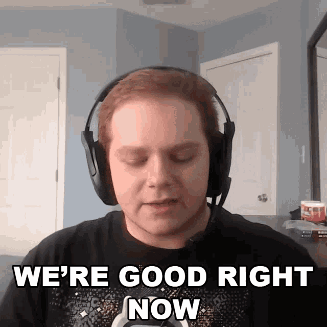a man wearing headphones with the words we 're good right now below him