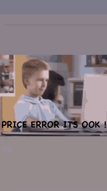 a boy sitting in front of a laptop with the words price error it 's ok on the bottom