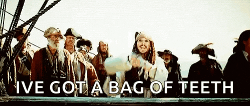 a group of pirates on a boat with the words `` i 've got a bag of teeth '' on the bottom .