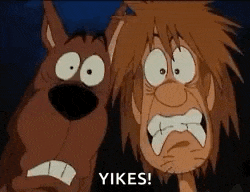 a cartoon dog and a cartoon man are standing next to each other and yelling .
